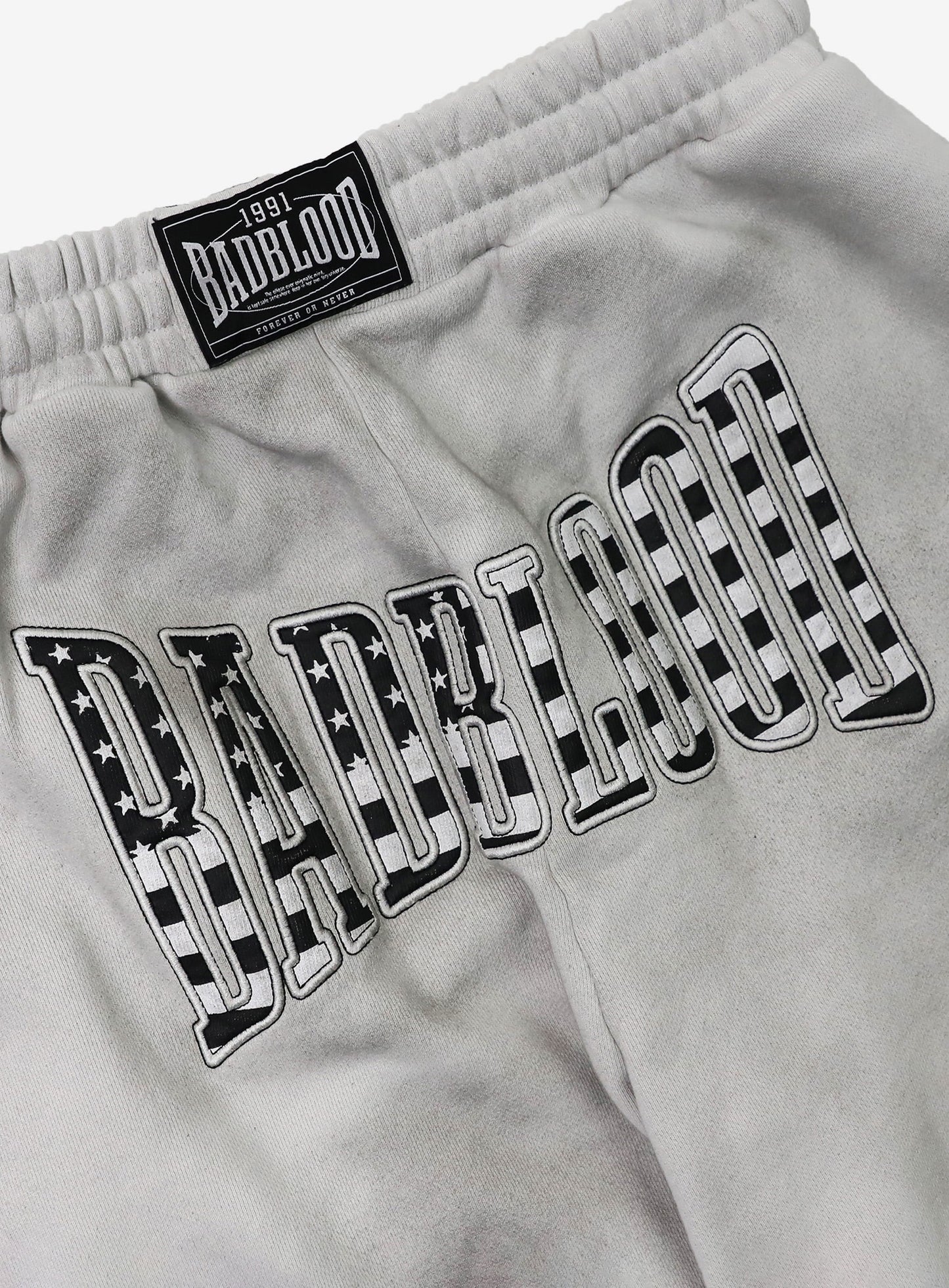 [w-pts25-118] Shield Old Glory 2-Way Curved Jogger Trousers - Dusty White
