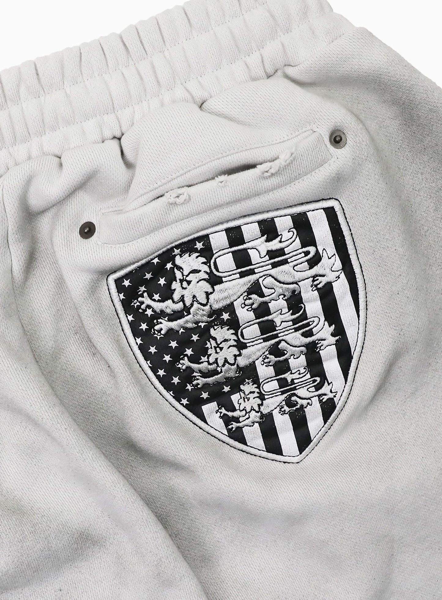 [w-pts25-118] Shield Old Glory 2-Way Curved Jogger Trousers - Dusty White