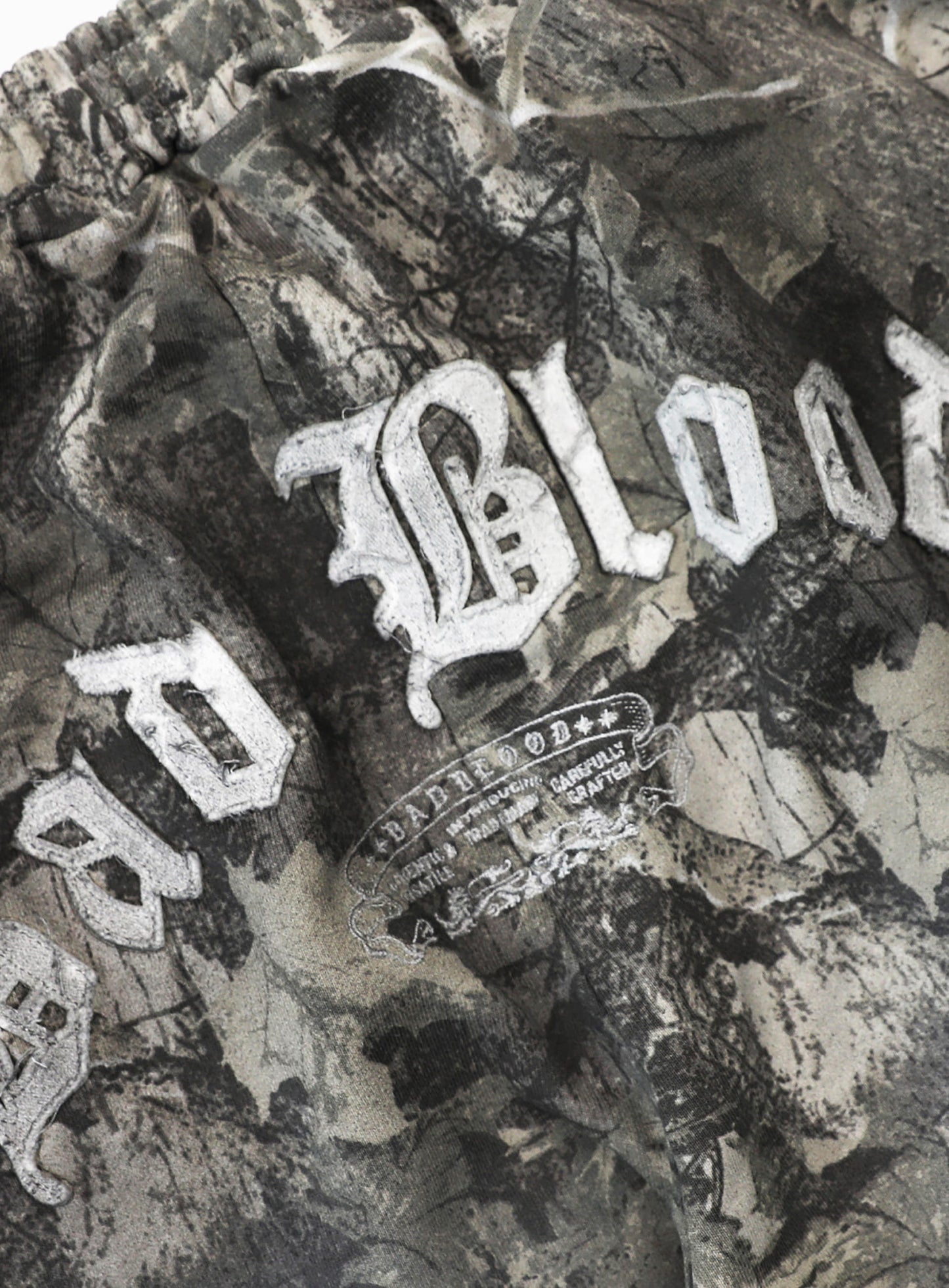 Lion Patch 2-Way Curved Jogger - Light Real Tree